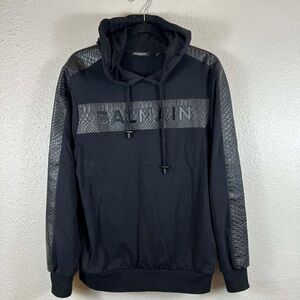 Balmain black cotton hoodie with a logo print and faux-snakeskin sleeves